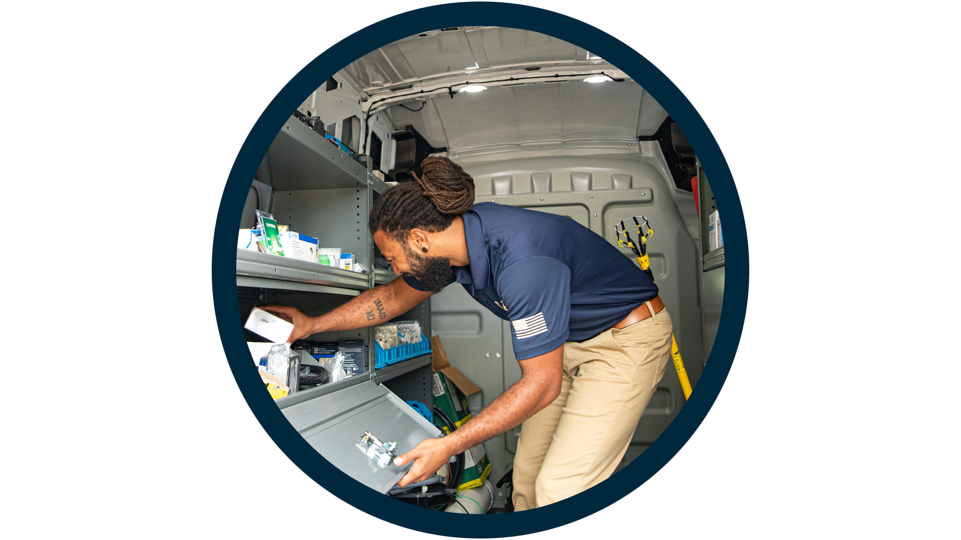 Technician inside SALT service van organizing tools, parts, and HVAC repair equipment, framed in a circular blue outline