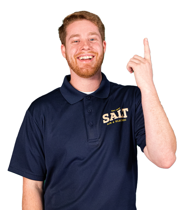 Smiling SALT technician in navy uniform raising one hand and pointing upward, conveying a positive and welcoming gesture