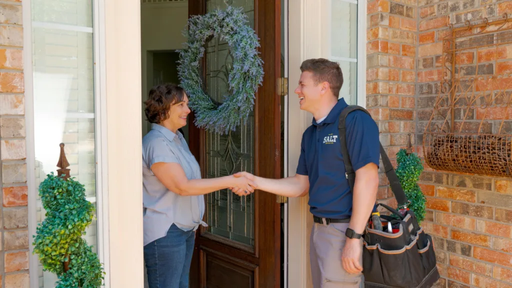 customer talking to hvac technician